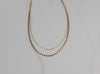 Detalle de collar doble con baño de oro 18k
