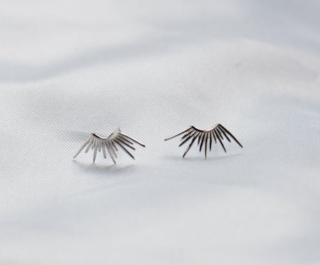 Aretes en forma de rayos de sol en plata 925
