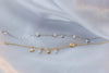 Dos pulseras con pendientes de mar, conchas, estrellas de mar en plata 925 y baño de oro 18k