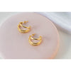Aretes de argolla triple en baño de oro 18k