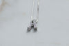 Collar con pendiente de letra A color plata con zirconias