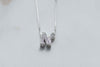 Collar con pendiente de letra N color plata con zirconias