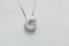 Collar con pendiente de letra G color plata con zirconias