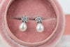 Detalle Aretes de perla con flor en plata 925