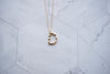 Collar con pendiente letra D color oro