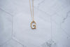 Collar con pendiente letra G color oro