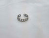 Anillo de cadena ajustable color plata frente