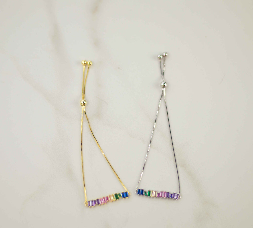 Pulseras brazalete extendidas color oro y plata con zirconias de colores