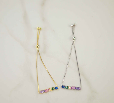 Pulseras brazalete extendidas color oro y plata con zirconias de colores